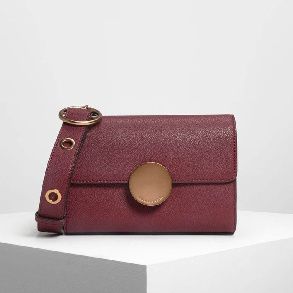 NWT Charles &‎ Keith Burgundy Circular Push Lock Crossbody Bag